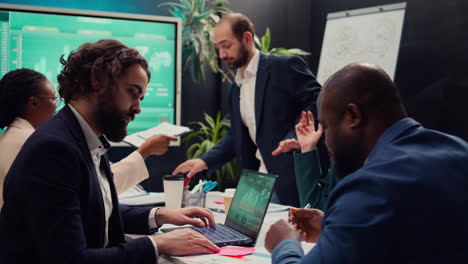 Team-of-associates-working-on-resource-allocation-plans-during-a-meeting