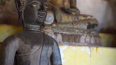 Close-Up-View-Of-Bronze-Buddha-Statue-At-Wat-Si-Saket-In-Vientianne,-Laos