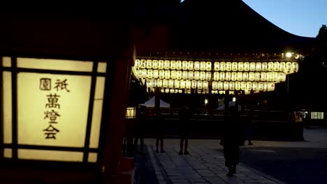 Background-Focus-View-Of-Buden-Stage-With-Illuminated-Hanging-Lanterns