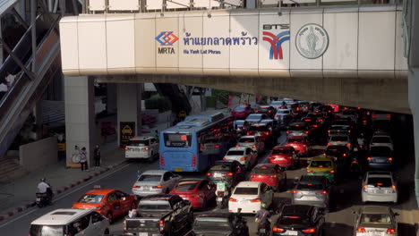 Traffic-on-a-standstill-in-one-of-the-busiest-streets-in-the-middle-of-the-city-of-Bangkok,-Thailand