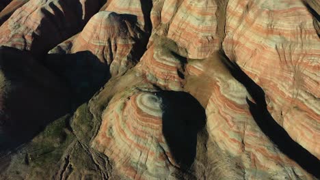 Aerial-view-Petra,-Jordan,-Middle-East-Drone-camera-moving-forward-showing-small-mountains