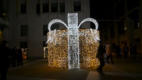 Orange-Christmas-Present-within-Paternoster-Square,-London,-United-Kingdom