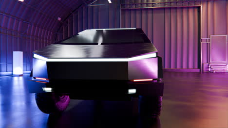 Cybertruck-En-Un-Hangar-Futurista-Iluminado-Por-LED