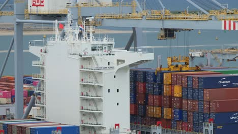 Gantry-crane-loading-45ft-container-on-deck-of-a-large-container-vessel-in-the-port-of-Rotterdam