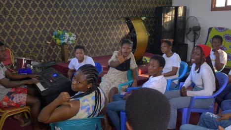 African-united-people-rehearsing-together-for-the-religious-choir-in-rustic-church