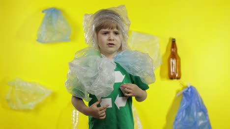 Girl-activist-free-up-from-plastic-packages-on-her-neck-and-head.-Plastic-pollution.-Save-ecology