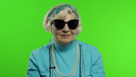 Elderly-stylish-grandmother.-Caucasian-woman-posing-on-chroma-key-background