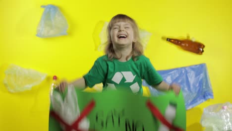 Girl-activist-holding-green-poster-Say-no-to-Plastic.-Plastic-nature-pollution