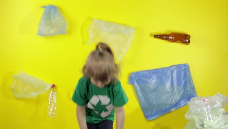 Girl-activist-volunteer-in-green-t-shirt-with-recycle-logo.-Plastic-pollution