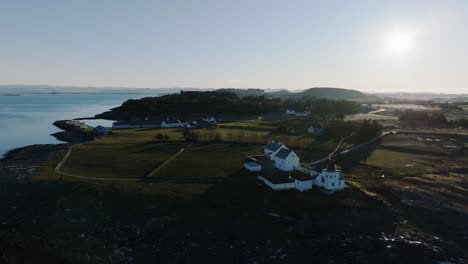 Aerial-View-of-Tungenes-Lighthouse-and-Headland,-Historic-Building-and-Landscape-Near-Randaberg,-Norway