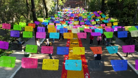 Tilt-up-boom-down-of-the-atrium-of-the-Iztapalapa-Cathedral-decorated-with-bright-colors-for-the-Day-of-the-Dead---CDMX,-Mexico