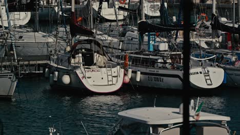 Sailboats-moored-in-dense-marina,-Naples