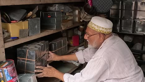 9425-A-shopkeeper-is-cleaning-his-shop