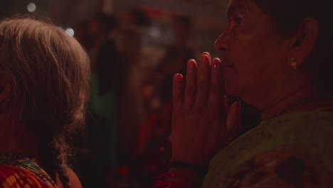 Group-of-devoted-elder-people-praying-in-religious-Indian-ceremony