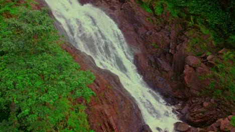 Captivating-drone's-eye-view-of-the-majestic-Bijagual-Waterfall-in-the-heart-of-Costa-Rica's-lush-landscapes