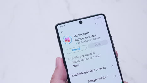 Downloading-the-Instagram-app-on-a-mobile-smartphone-for-social-media