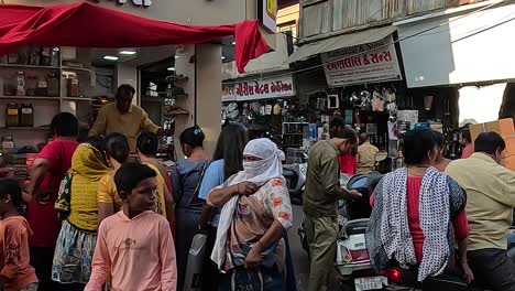 Women-are-buying-everyday-items-in-the-street-market-during-the-day-time