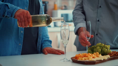 Young-man-pouring-wine