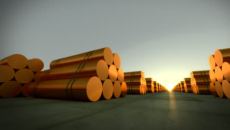 Loopable-animation-presents-stacks-of-cylindrical-copper-billets.-Copper-in-its-purest-form.-It-has-excellent-electrical-and-thermal-conductivity.-In-background-cloudless-dawn-sky.