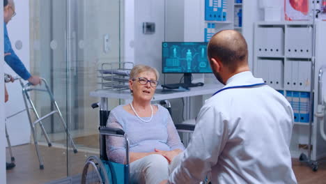 Elderly-woman-in-wheelchair-at-doctor-appointment