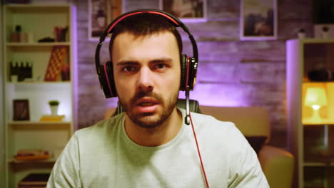 Pov-of-young-man-sitting-on-gaming-chair