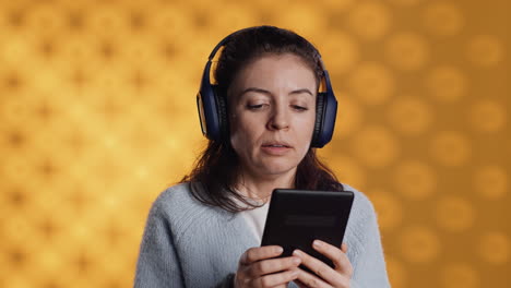 Woman-wearing-headphones,-practicing-new-language-using-internet-app