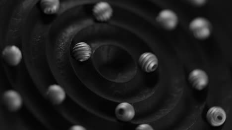 The-video-features-an-animation-of-3D-beads-in-a-circling-loop,-showcasing-their-fluid-and-continuous-motion.-This-hypnotic-display-emphasizes-the-beads'-seamless-movement-and-the-beauty-of-their-synchronized--3D-Balls-Beads-Rolling