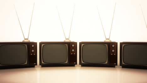 The-loopable-collection-of-an-old-fashioned-retro-color-tv-sets-with-the-antenna-tuner.-Vintage,-nostalgic-electronic-devices-stack.-Brown,-obsolete-television-is-displaying-a-green-screen.