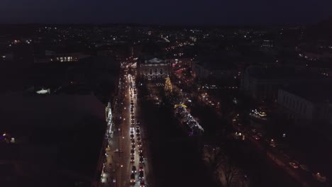 Christmas-tree,-Fair-market,-aerial-view-in-city-center-at-winter,-New-Year-2021-in-Lviv,-Ukraine