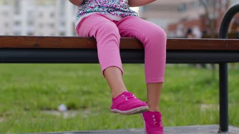 Female-child-girl-playing-push-pop-it-bubble-fidget-stress-anxiety-relief-squeeze-sensory-toy-game