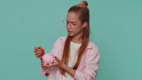 Poor-teen-girl-holding-piggybank-and-one-dollar-banknote,-financial-crisis,-bankruptcy,-debt,-fail