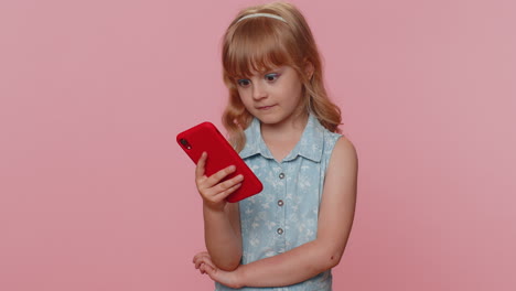 Child-girl-kid-use-mobile-smartphone-browsing-say-Wow-yes-found-out-great-win-good-news-celebrate