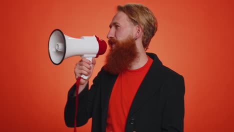 Smiling-bearded-man-talking-with-megaphone,-proclaiming-news,-loudly-announcing-sale-advertisement