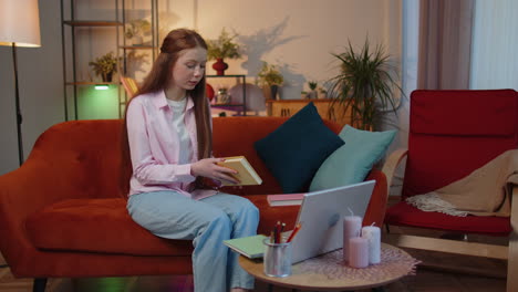 Child-girl-student-study-at-home-on-laptop-computer-making-conference-video-call-talking-to-webcam