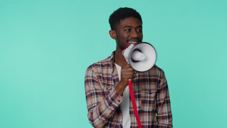 Smiling-bearded-man-talking-with-megaphone,-proclaiming-news,-loudly-announcing-sale-advertisement