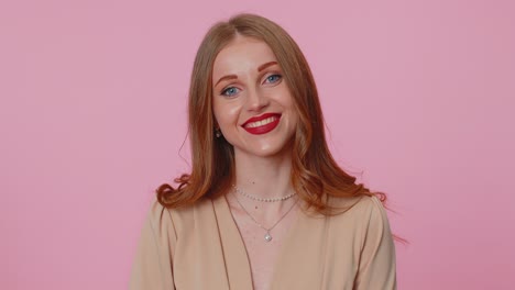 Cheerful-lovely-teenager-student-girl-fashion-model-in-beige-blouse-smiling-and-looking-at-camera