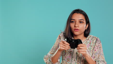 Cheerful-woman-playing-videogames-with-controller