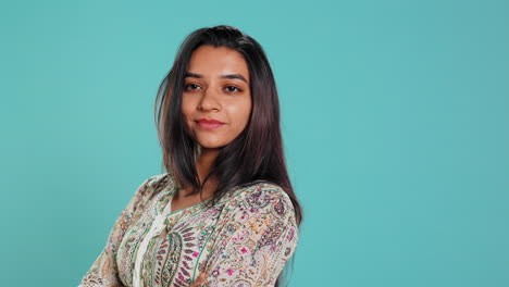 Portrait-of-optimistic-woman-with-positive-facial-expression-smiling