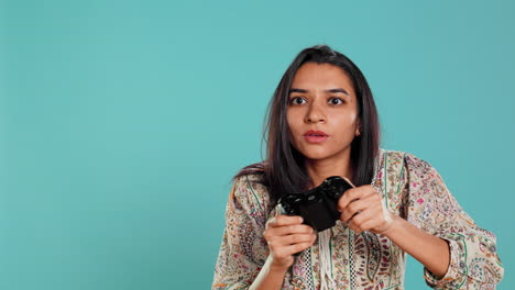 Competitive-woman-playing-videogames-with-motion-controlled-controller