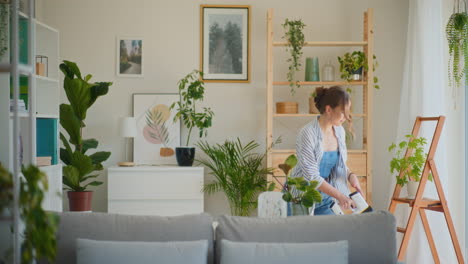 Joyful-Woman-Dancing-While-Vacuuming