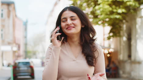 Happy-surprised-woman-involved-in-pleasant-conversation-phone-call-good-news-enjoying-talking-gossip