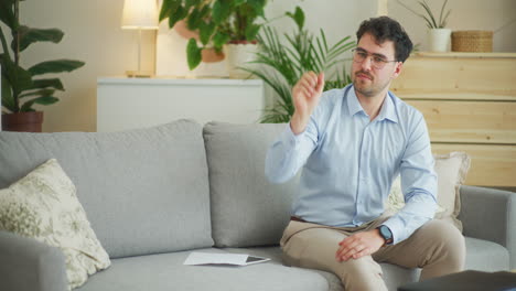 Man-Flies-Paper-Airplane-in-Office