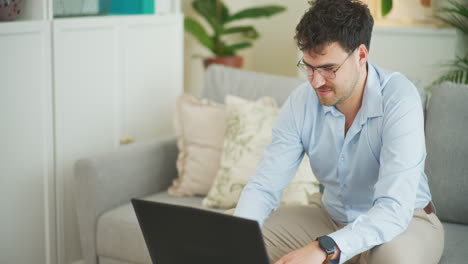 Happy-Businessman-Working-on-Computer