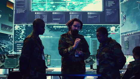 Army-officers-review-data-on-a-hologram-to-create-a-brief-for-the-new-mission
