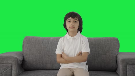 Serious-Indian-boy-looking-at-the-camera-Green-screen