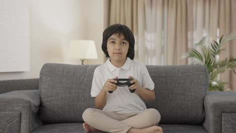 Competitive-Indian-boy-playing-video-games