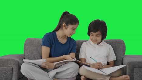 Indian-sister-teaching-her-brother-Green-screen