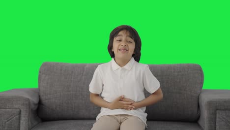 Sick-Indian-boy-suffering-from-stomach-pain-Green-screen