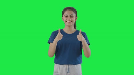 Happy-Indian-teenage-girl-showing-thumbs-up-Green-screen