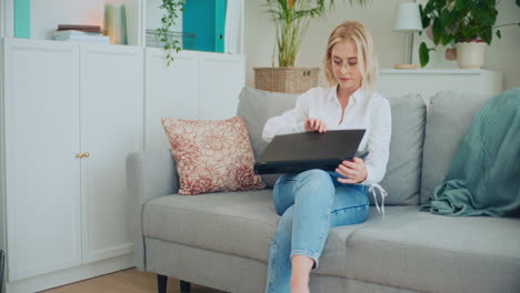 Enterprising-Girl-Works-Remotely-on-Laptop